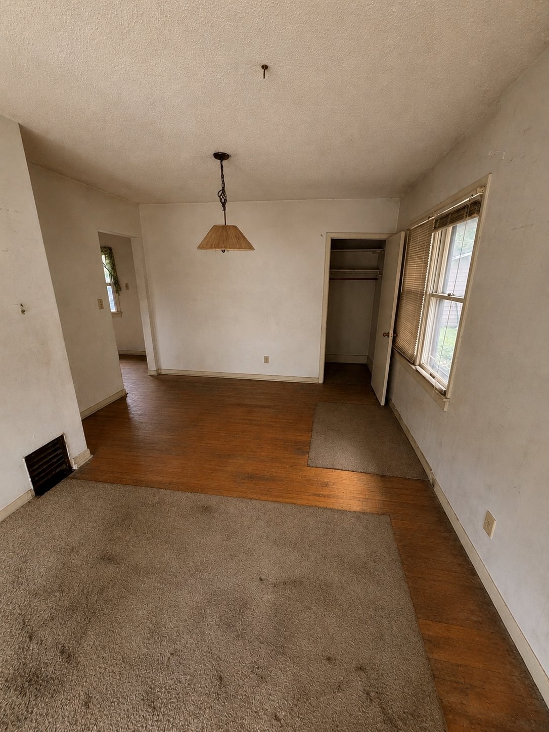 Living room cleared wall to wall after a Junk Bandits haul-away